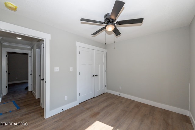 6105 Lanier Rd, Maryville, TN 37801 - unfurnished bedroom featuring wood finished floors, baseboards, a closet, a ceiling fan, and recessed lighting