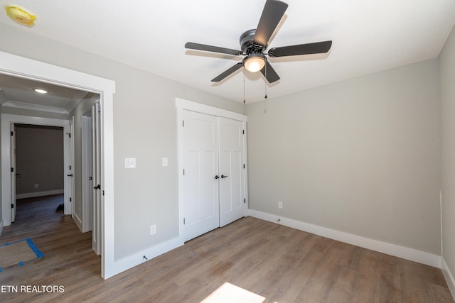 6105 Lanier Rd, Maryville, TN 37801 - unfurnished bedroom featuring light wood-type flooring, baseboards, a closet, a ceiling fan, and recessed lighting