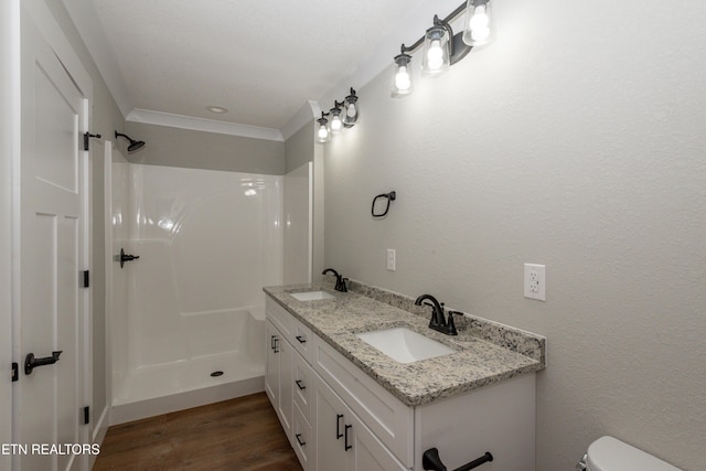 6105 Lanier Rd, Maryville, TN 37801 - full bathroom with wood finished floors, toilet, a shower, and double vanity