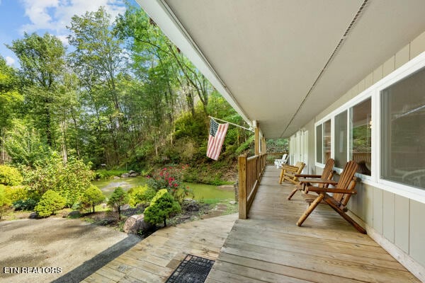 deck with covered porch