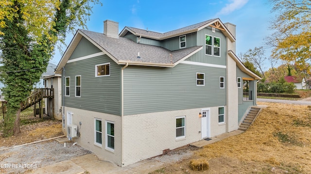 view of property exterior with ac unit