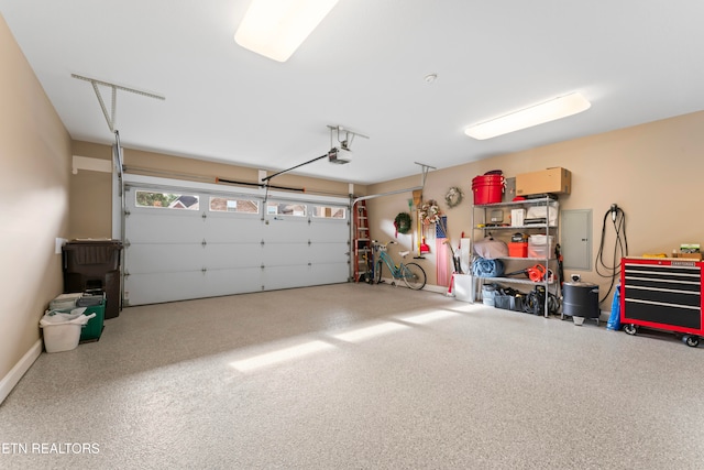 garage featuring a garage door opener