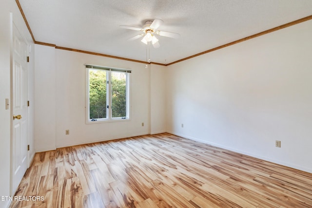 unfurnished room with a textured ceiling, light hardwood / wood-style flooring, ceiling fan, and ornamental molding