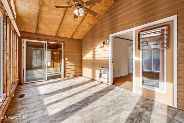 unfurnished sunroom with heating unit, ceiling fan, wooden ceiling, and vaulted ceiling