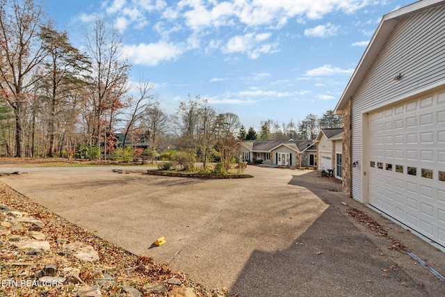 view of yard featuring a garage