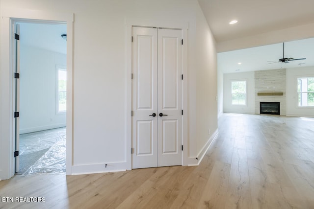 corridor featuring light wood-type flooring