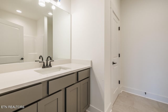 bathroom featuring vanity and tile patterned floors