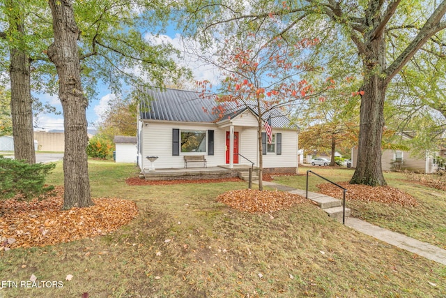 view of front of home with a front yard