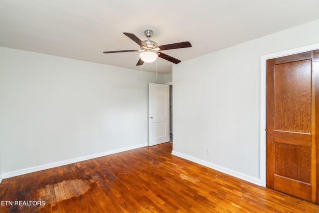 unfurnished bedroom with hardwood / wood-style floors and ceiling fan