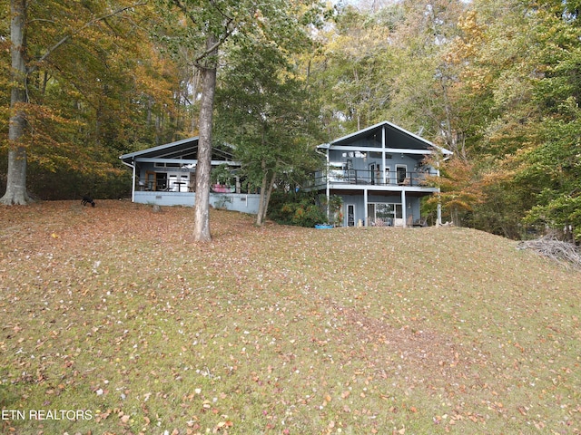 exterior space featuring a balcony