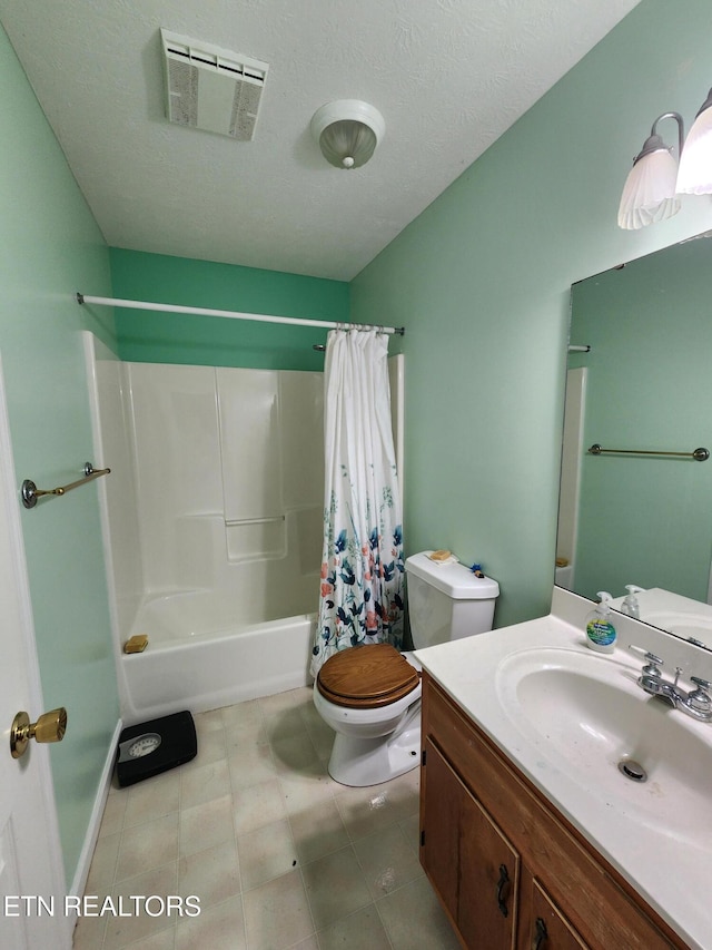 full bathroom with toilet, vanity, shower / bath combination with curtain, and a textured ceiling