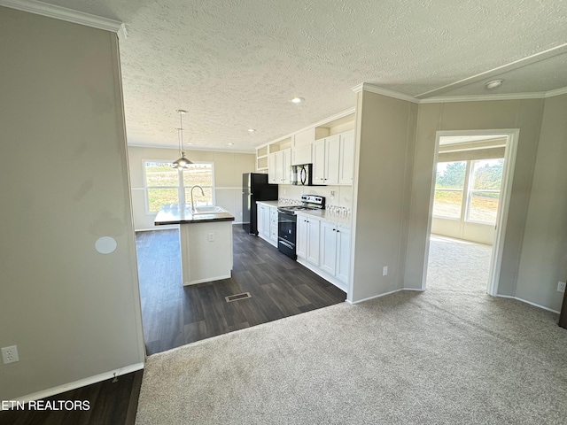 kitchen featuring hanging light fixtures, black appliances, a kitchen island with sink, dark hardwood / wood-style floors, and white cabinetry