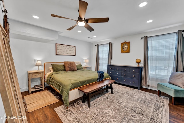 bedroom featuring ceiling fan and wood-type flooring