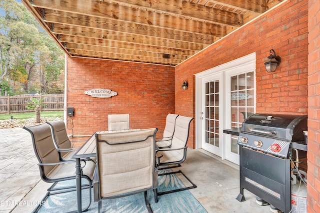 view of patio featuring grilling area and french doors