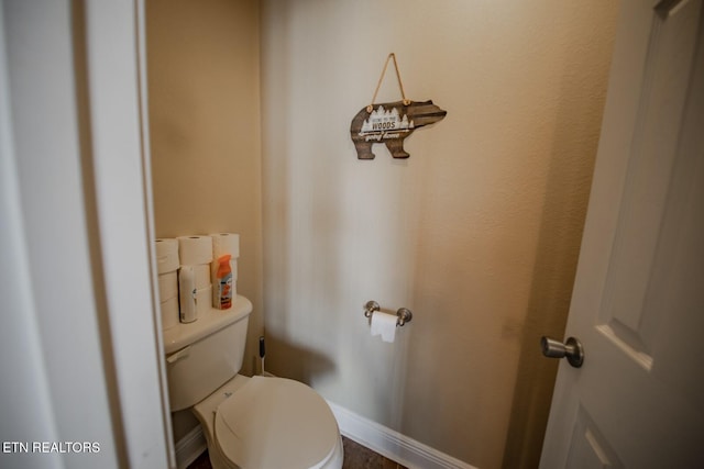 bathroom featuring toilet