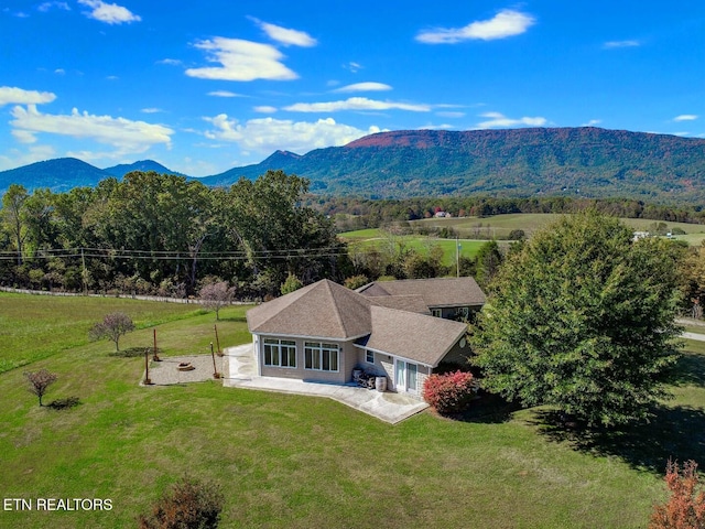 exterior space featuring a mountain view