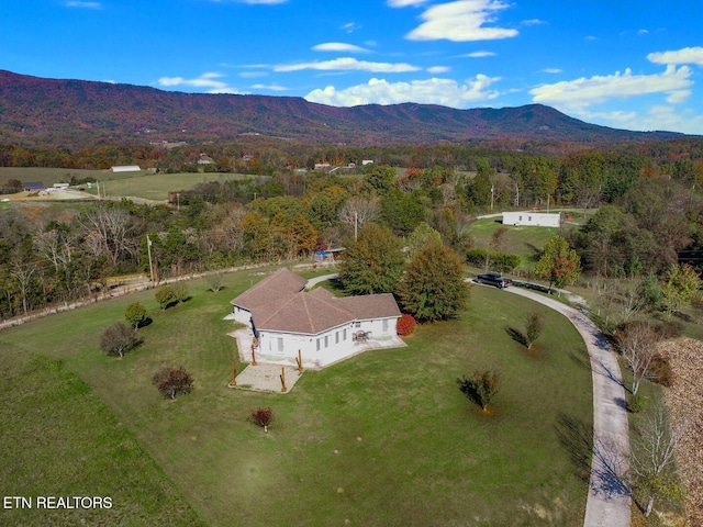 drone / aerial view featuring a mountain view