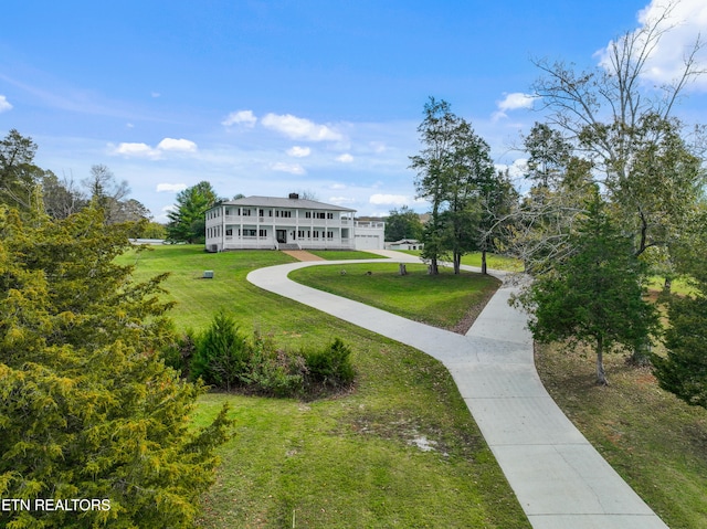 view of community with a lawn