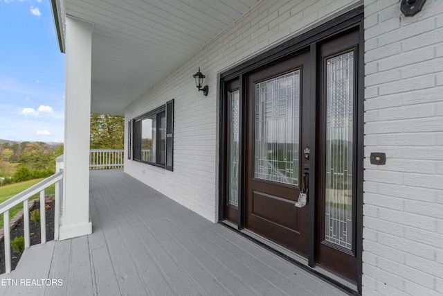 entrance to property with covered porch