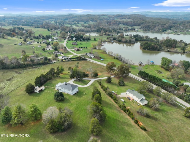 aerial view with a water view and a rural view