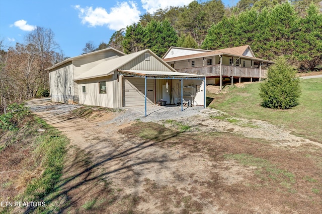 rear view of house with a deck