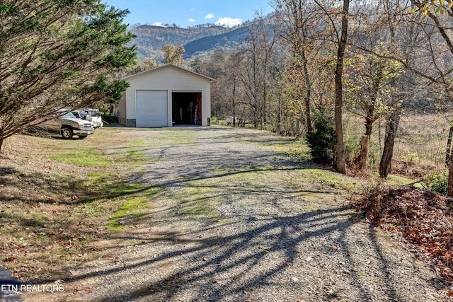 exterior space featuring a mountain view