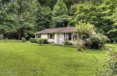 view of front of house with a front yard