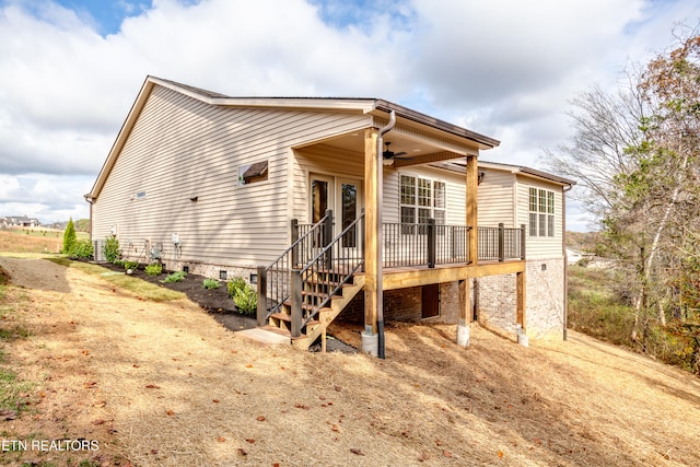 back of house featuring ceiling fan