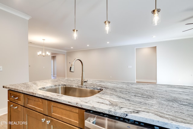 kitchen featuring sink, light stone counters, stainless steel dishwasher, crown molding, and pendant lighting