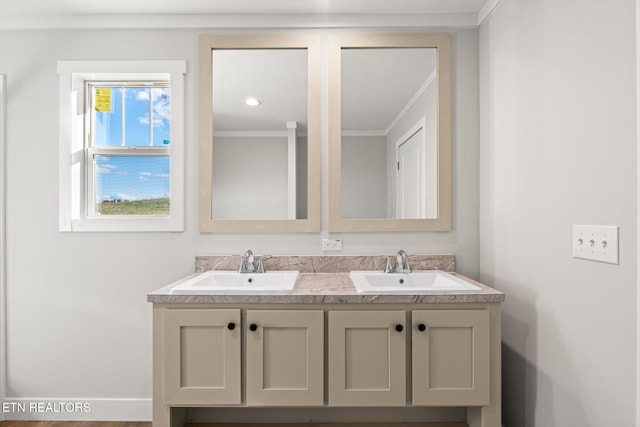 bathroom featuring vanity and crown molding