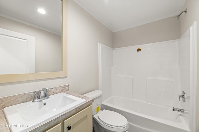 full bathroom featuring toilet, bathtub / shower combination, vanity, and ornamental molding