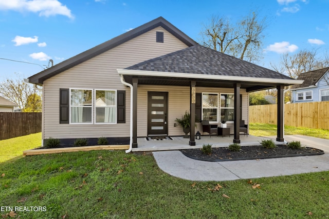 view of front of home with a front yard