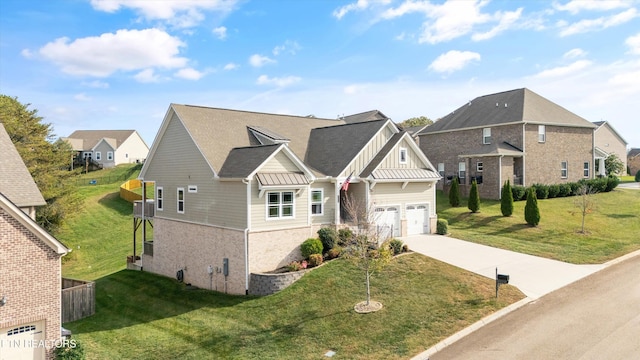 view of front of home featuring a garage and a front lawn