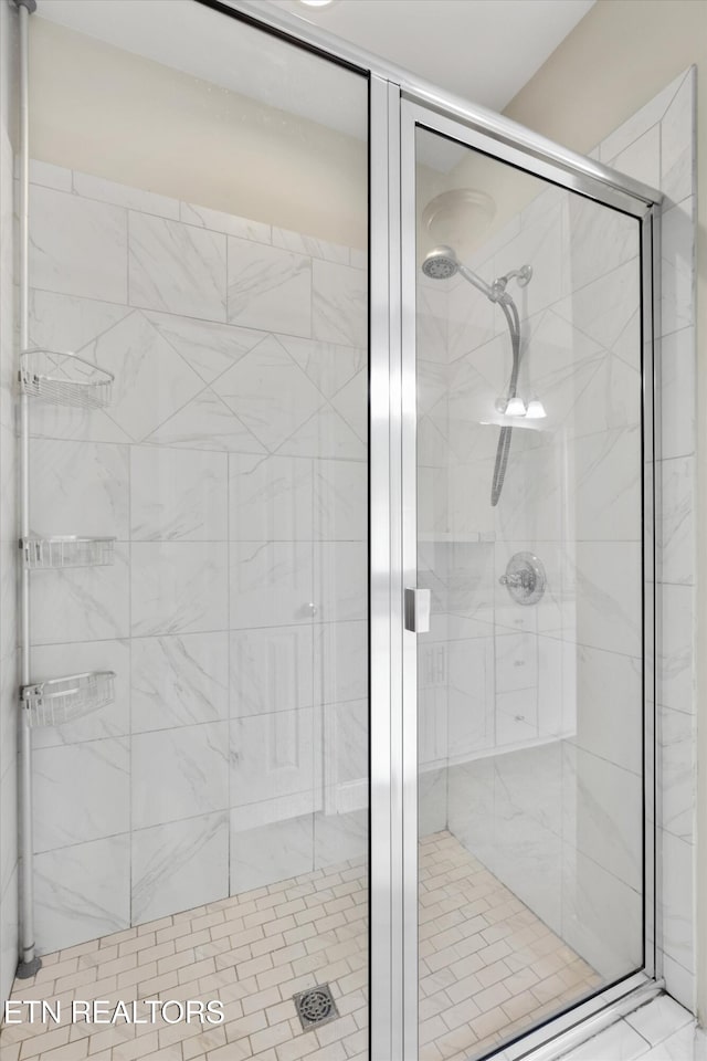 bathroom featuring walk in shower