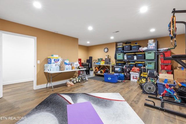 interior space with hardwood / wood-style flooring