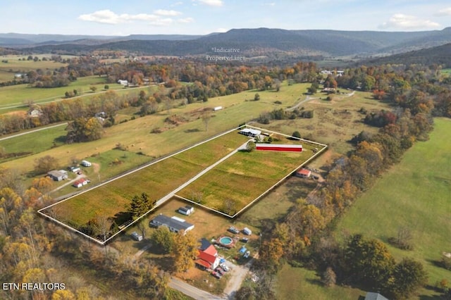 drone / aerial view featuring a mountain view