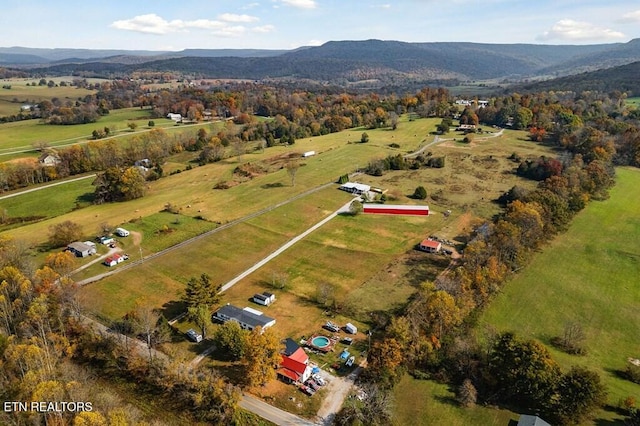 drone / aerial view featuring a rural view and a mountain view