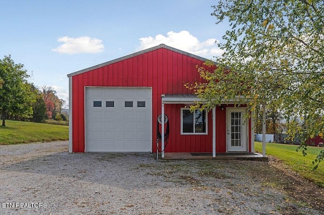 garage with a yard