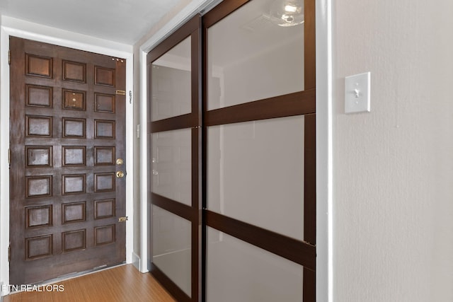 foyer with hardwood / wood-style floors