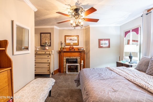 bedroom featuring ornamental molding, carpet floors, a textured ceiling, a high end fireplace, and ceiling fan