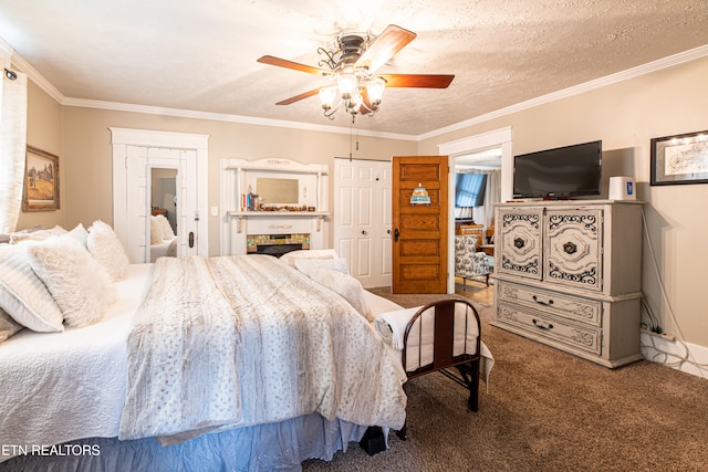 carpeted bedroom with a textured ceiling, ceiling fan, and crown molding