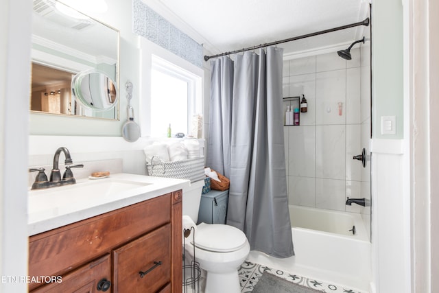 full bathroom with ornamental molding, vanity, toilet, a textured ceiling, and shower / tub combo with curtain