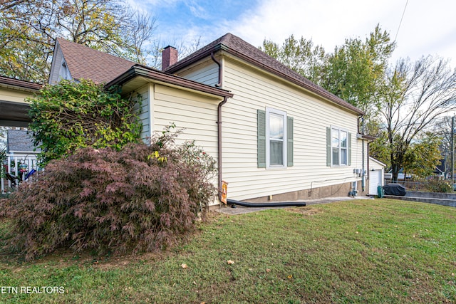 view of property exterior featuring a yard