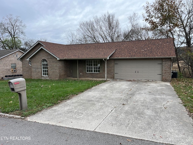 single story home with a garage, central air condition unit, and a front yard