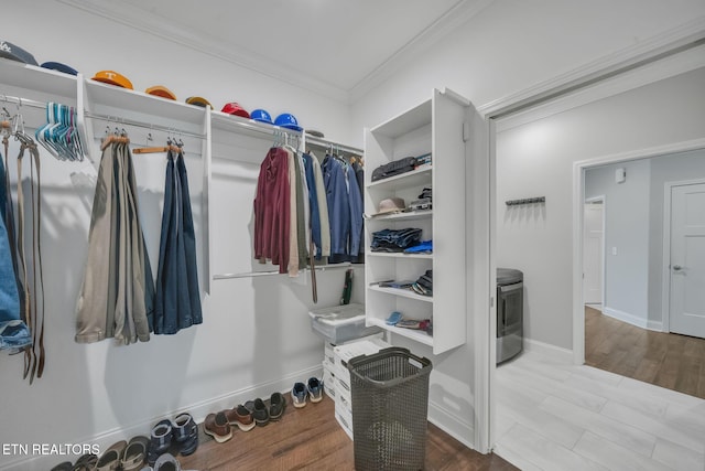 spacious closet featuring hardwood / wood-style floors