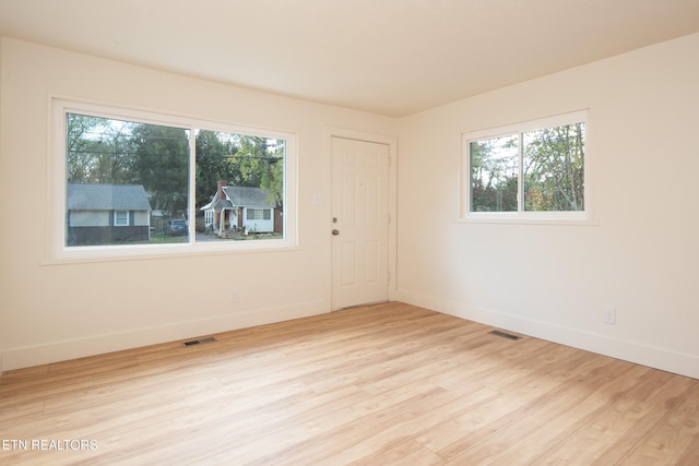 empty room featuring light hardwood / wood-style flooring