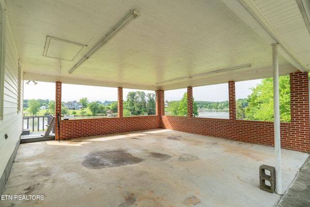 view of patio featuring a water view