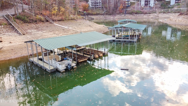 view of dock with a water view and boat lift