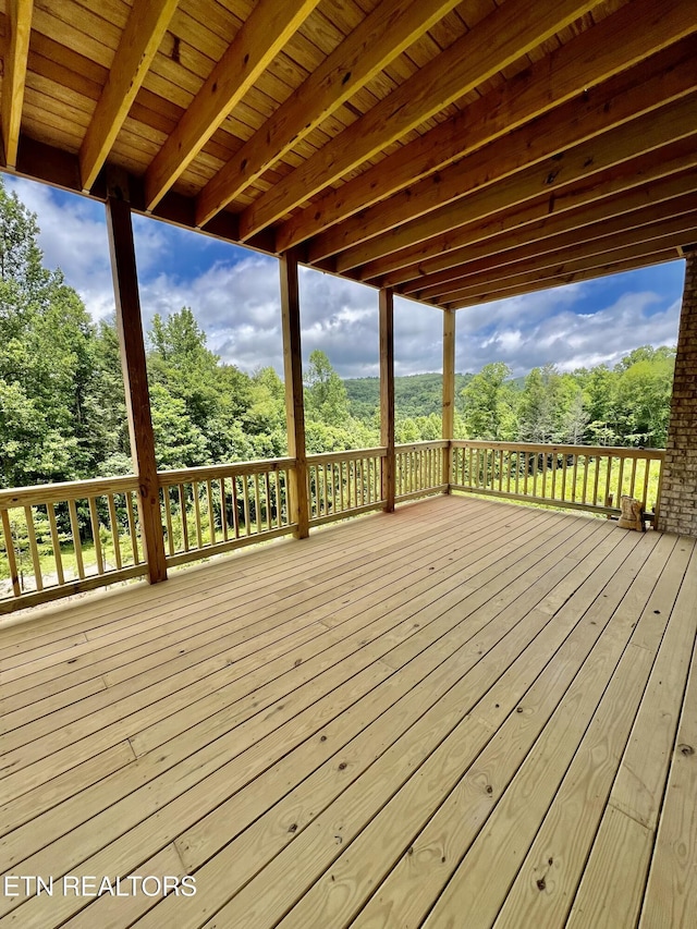 139 Pool Rd, Lafollette, TN 37766 - wooden terrace featuring view of wooded area