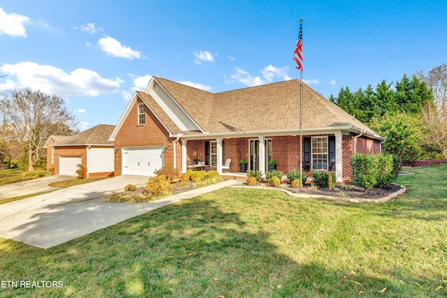 view of front of home featuring a front lawn and a garage